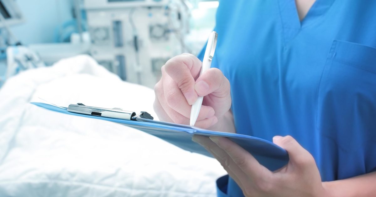 Female doctor monitors the patient's condition
