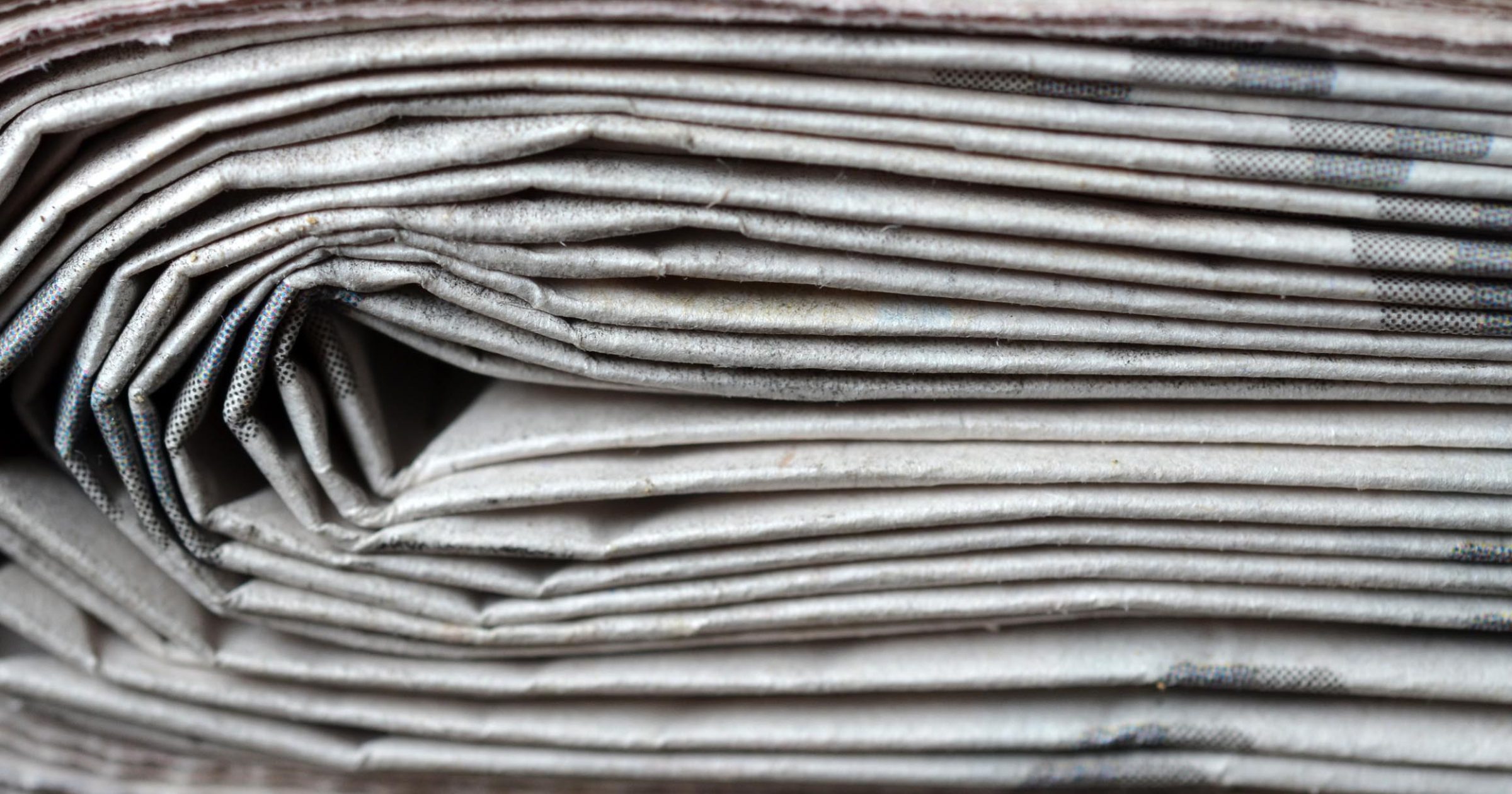 Stack of newspapers close up