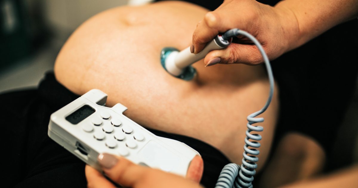 pregnant woman with midwife