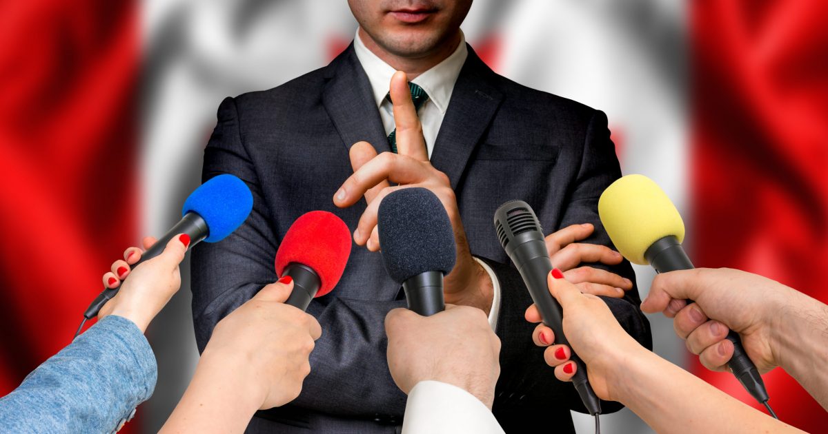 Canadian candidate speaks to reporters - journalism concept