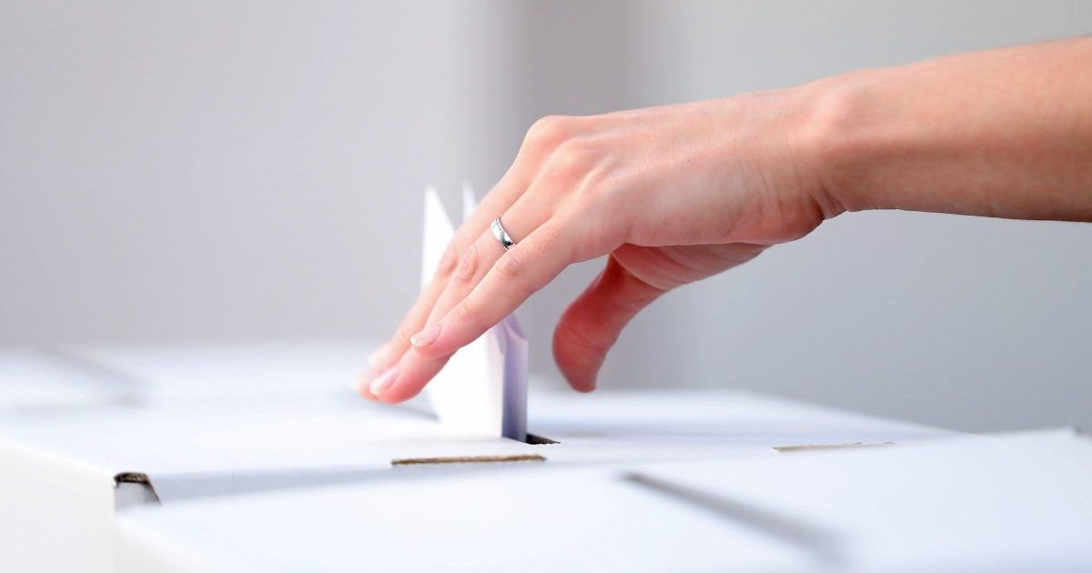Woman casts her ballot at elections