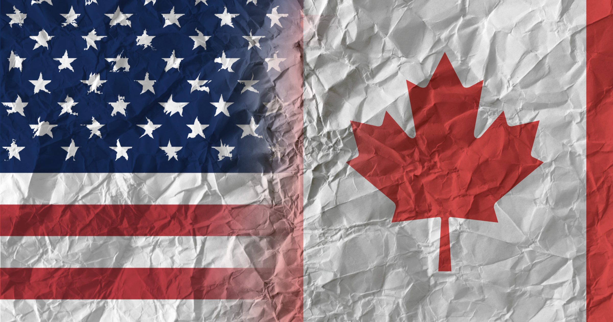 US and Canada on crumpled paper, policy and relations concept