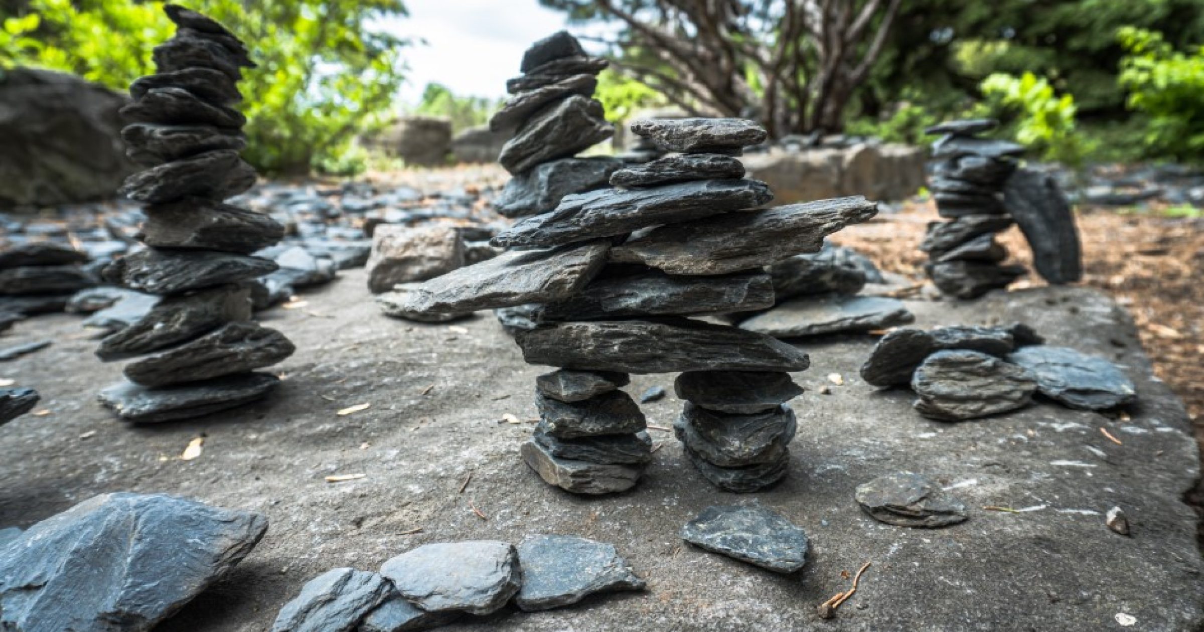 An inuksuk manmade human or cross shaped stone landmark or cairn